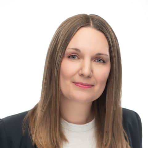 Headshot of Jennifer Coleman-Peers, smiling to camera